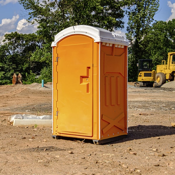 what is the cost difference between standard and deluxe portable toilet rentals in Goshen